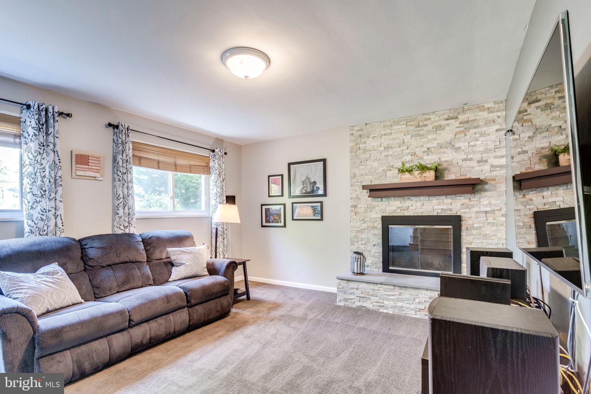 3002 Farm Road Alexandria, VA 22302 - Photo 32 of 40 Updated family room with woodturning fireplace