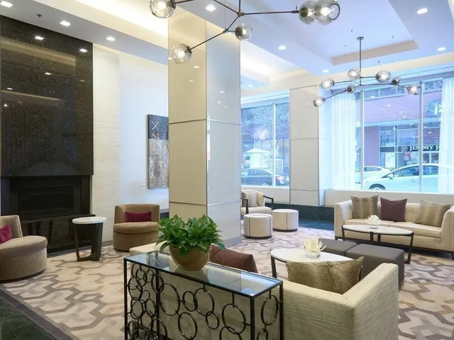 a living room with furniture and a rug