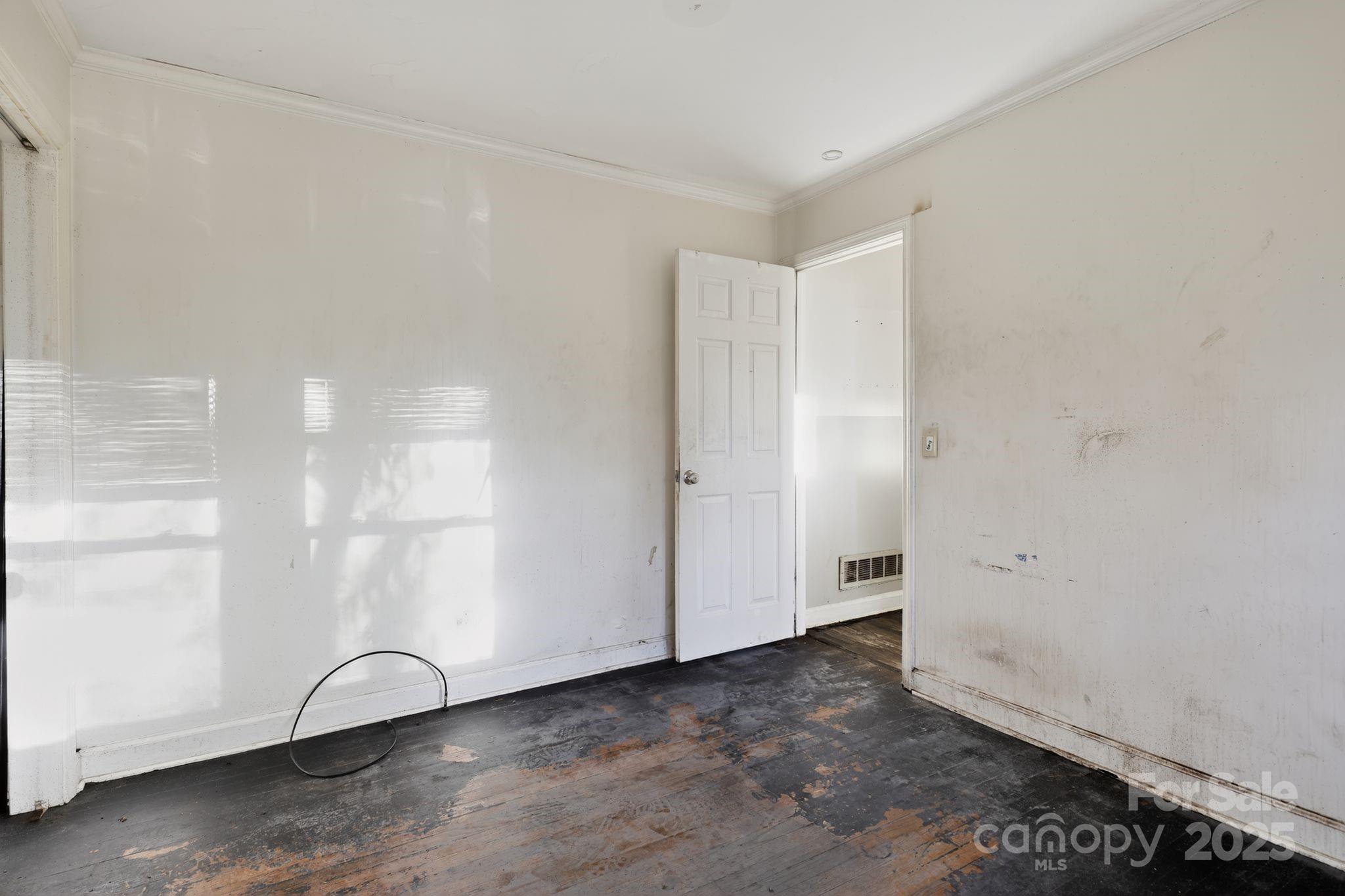 3116 Truman Street Columbia, SC 29204 - Photo 11 of 34 a view of an empty room with wooden floor