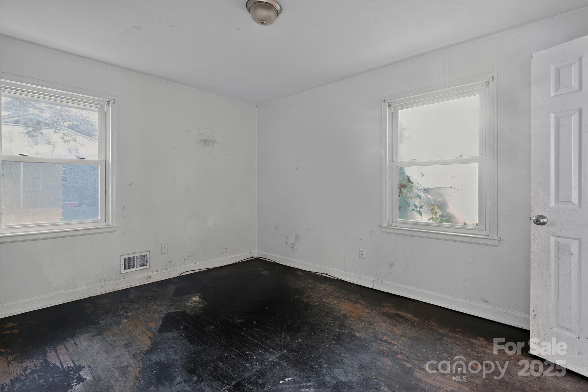 3116 Truman Street Columbia, SC 29204 - Photo 17 of 34 a view of room with window and hardwood floor
