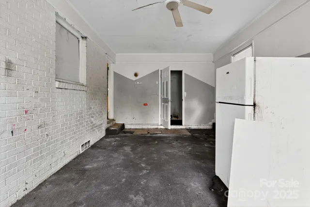 a view of a refrigerator in a kitchen
