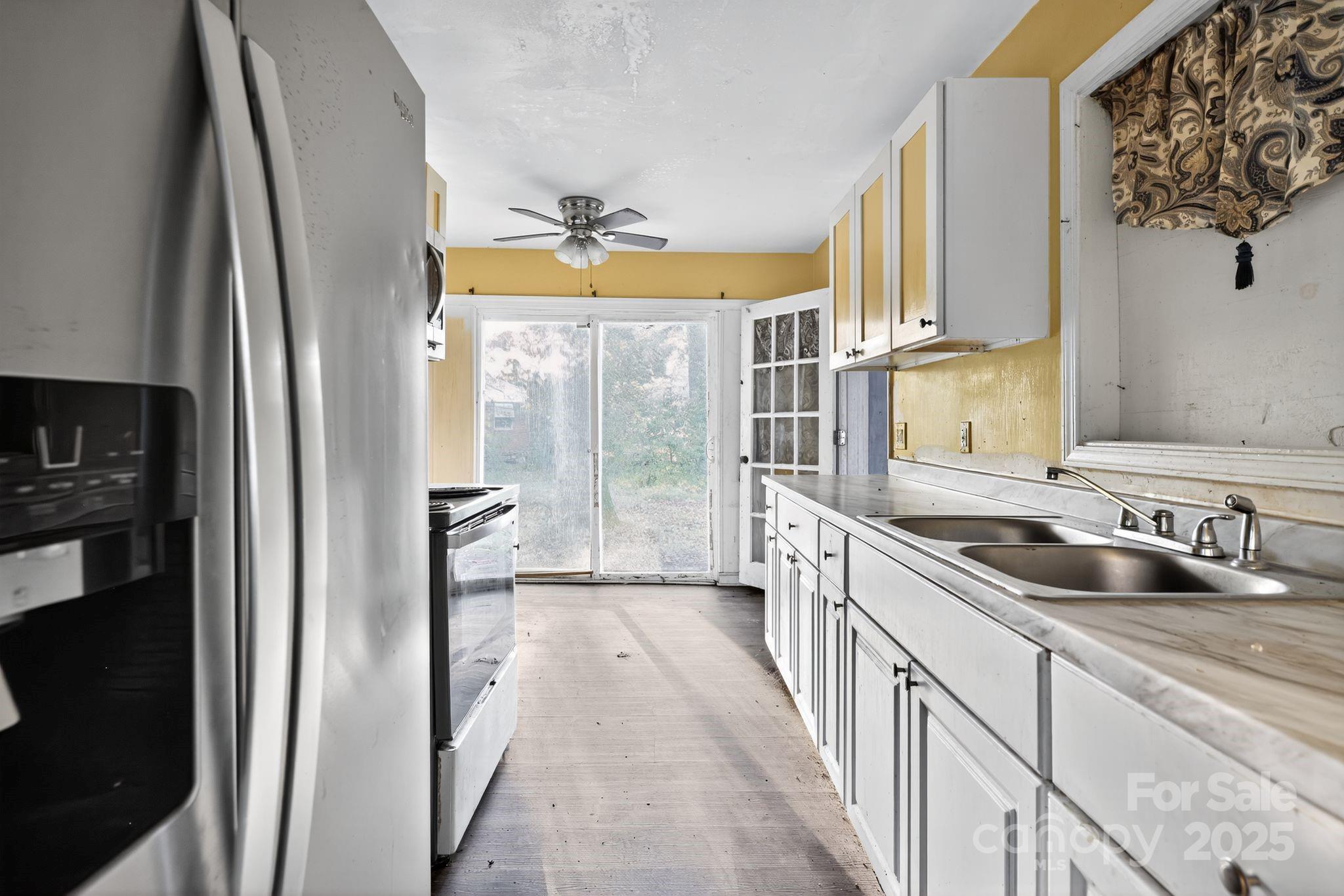 3116 Truman Street Columbia, SC 29204 - Photo 19 of 34 a bathroom with a double vanity sink and a mirror