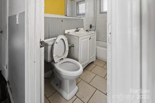 a bathroom with a sink and toilet