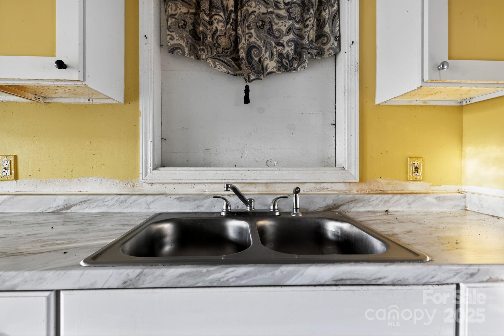 3116 Truman Street Columbia, SC 29204 - Photo 29 of 34 a bathroom with a sink and a mirror