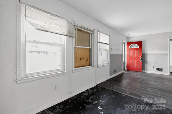 an empty room with windows