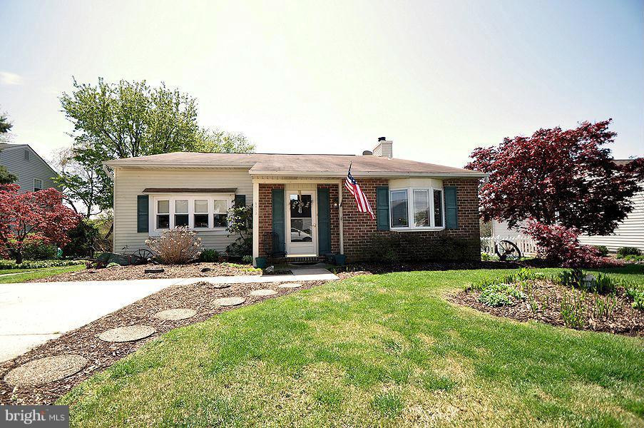 4813 Vicky Road Baltimore, MD 21236 - Photo 1 of 22 a front view of a house with a garden