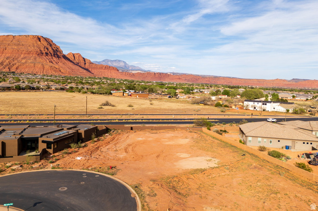 545 Wild Indigo Way, Unit 60 Ivins, UT 84738 - Photo 3 of 15 Aerial perspective of suburban area featuring mountains