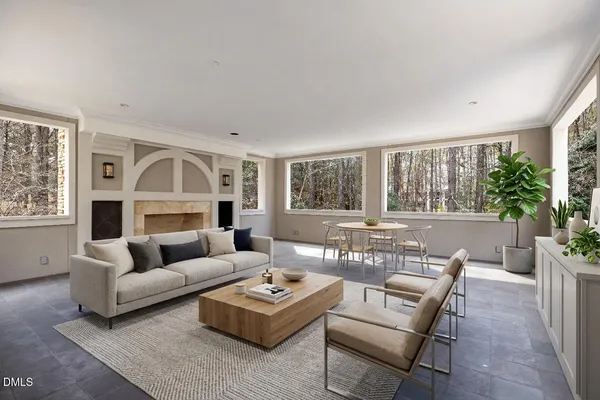 a view of a living room with windows