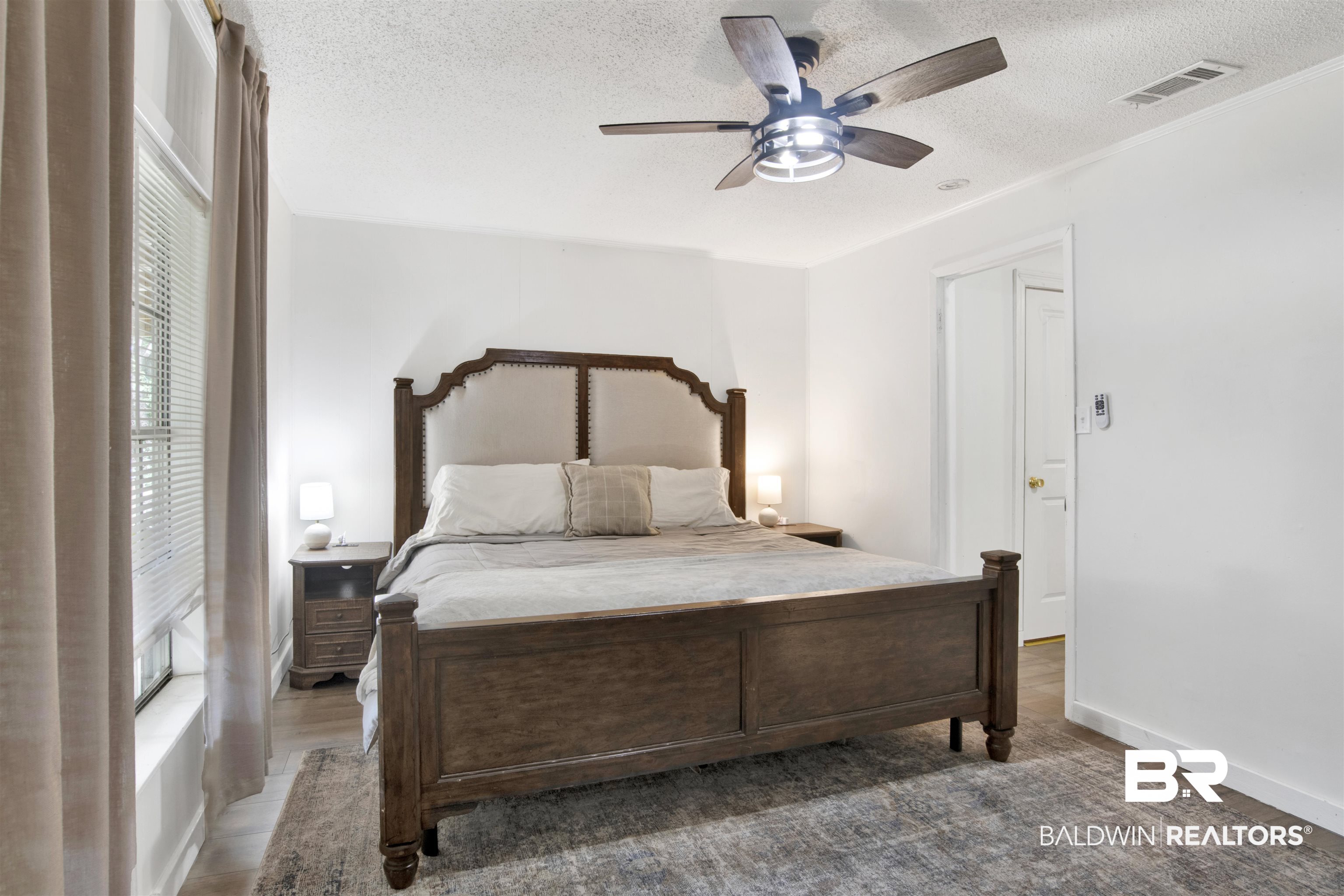 4265 Greaves Road Eight Mile, AL 36613 - Photo 14 of 34 Bedroom with a textured ceiling and ceiling fan