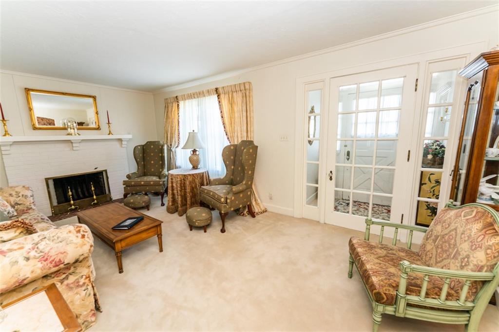 707 South 6th Street Indiana, PA 15701 - Photo 2 of 16 a living room with furniture and a fireplace