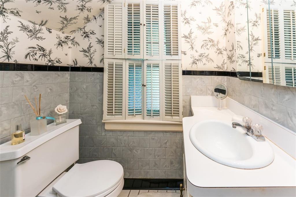 707 South 6th Street Indiana, PA 15701 - Photo 6 of 16 a bathroom with a sink a toilet and a tub