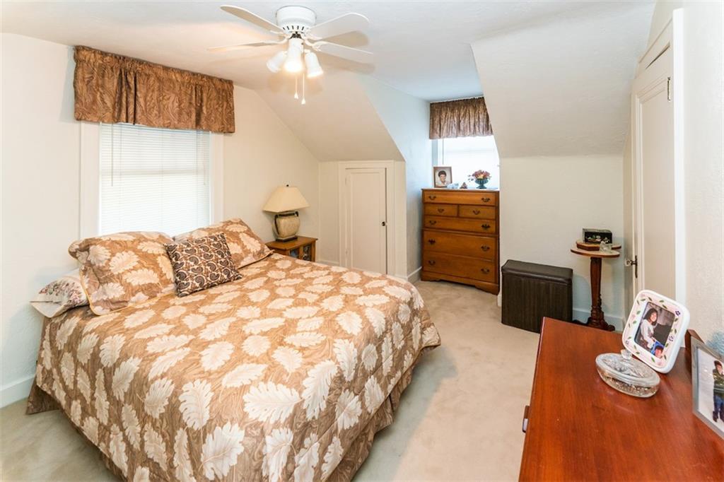 707 South 6th Street Indiana, PA 15701 - Photo 10 of 16 a bedroom with a bed and wooden floor