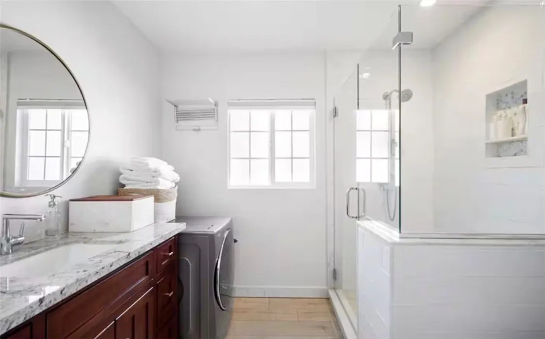1550 West Palais Road Anaheim, CA 92802 - Photo 5 of 8 a room with a sink and a mirror