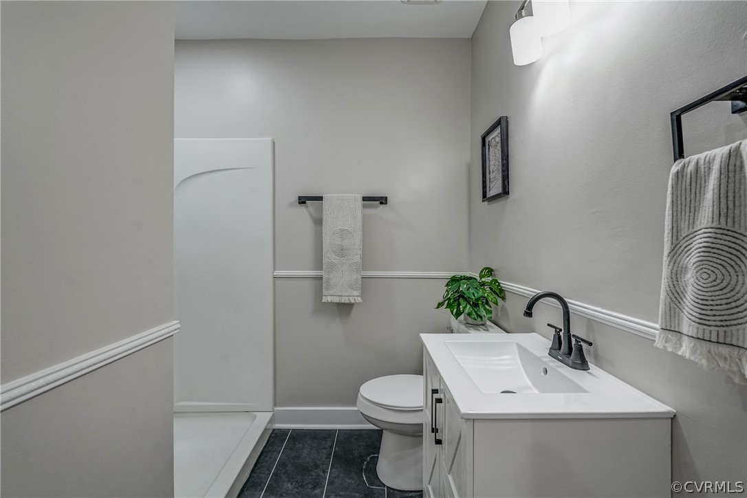 811 Overbrook Road Richmond, VA 23222 - Photo 25 of 50 Bathroom with vanity, tile patterned flooring, and