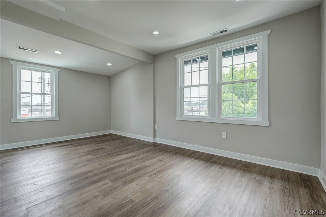 811 Overbrook Road Richmond, VA 23222 - Photo 27 of 50 Unfurnished room with hardwood / wood-style floori