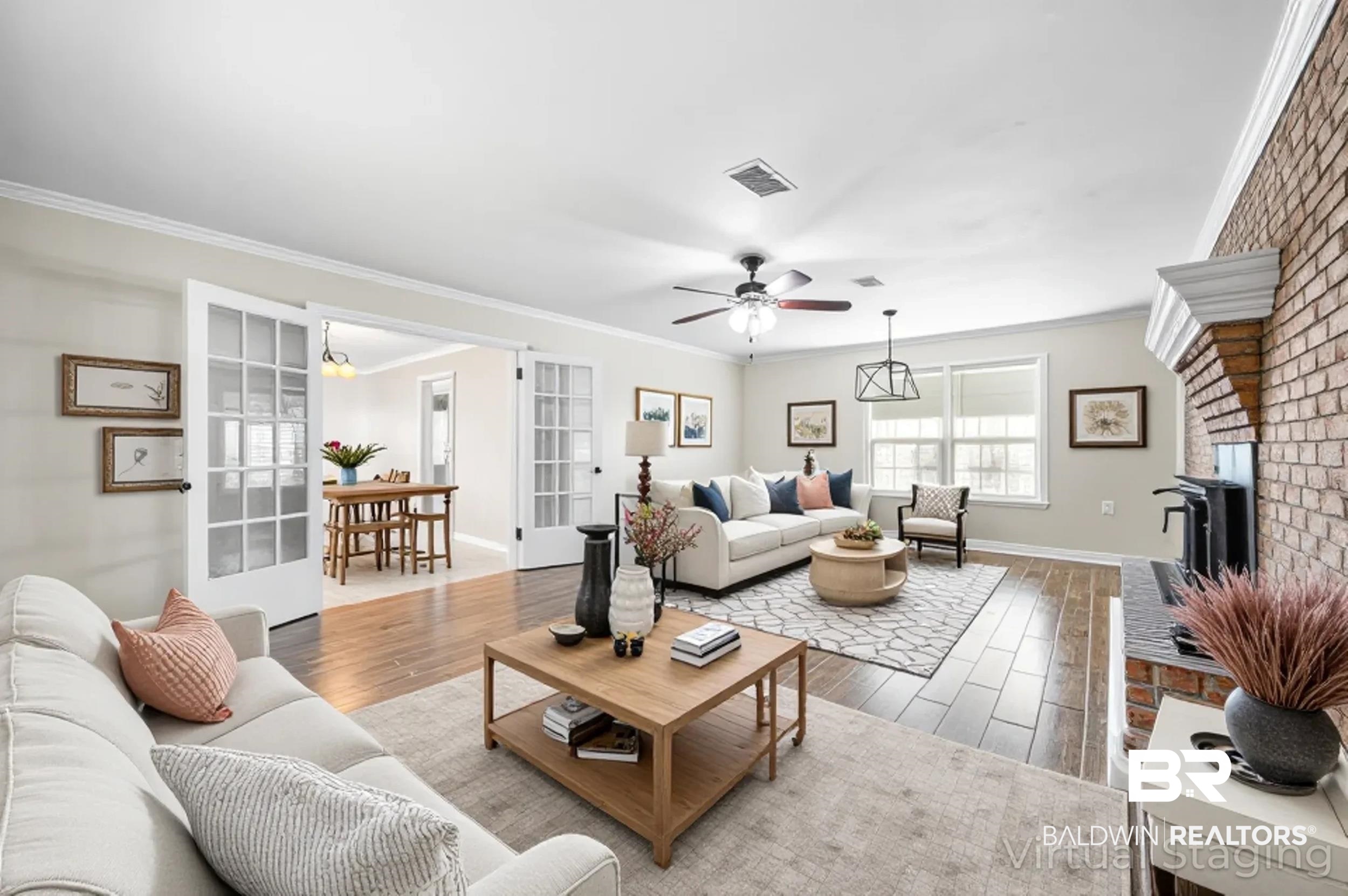 1605 Collier Avenue Bay Minette, AL 36507 - Photo 10 of 36 Living room with ornamental molding, wood finished floors, ceiling fan, and a brick fireplace