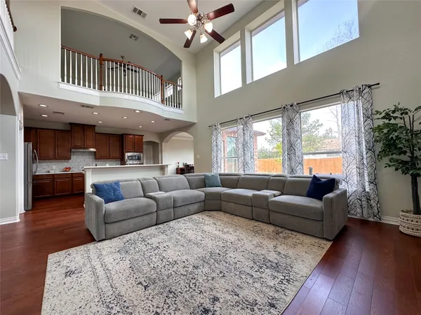 a kitchen with a sink stove and microwave