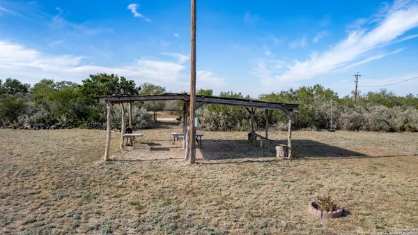 a view of a garden with a bench