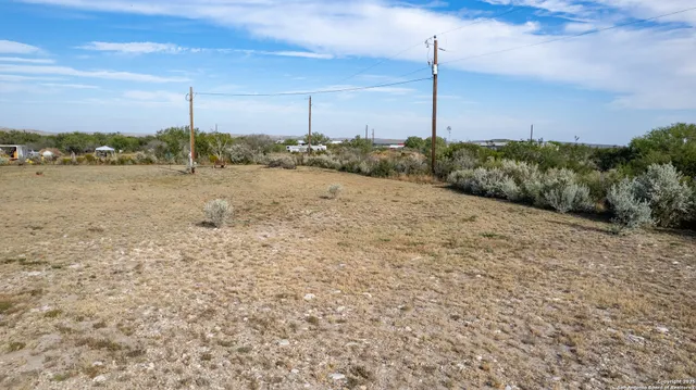 a view of a road with an ocean view