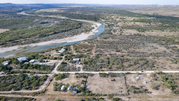 an aerial view of residential house and green space