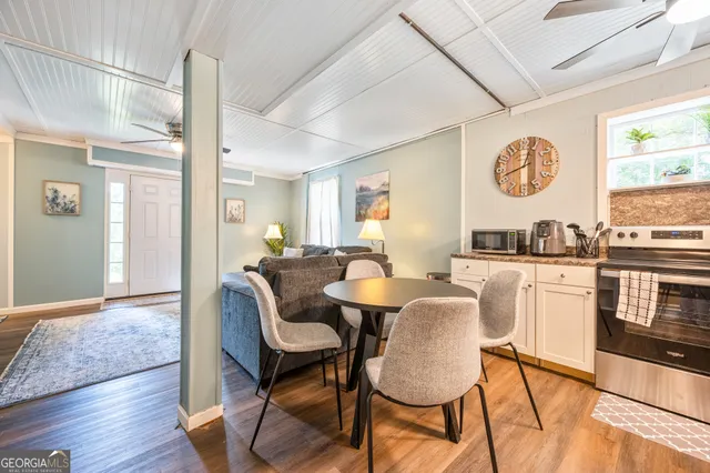 a living room with furniture and a table