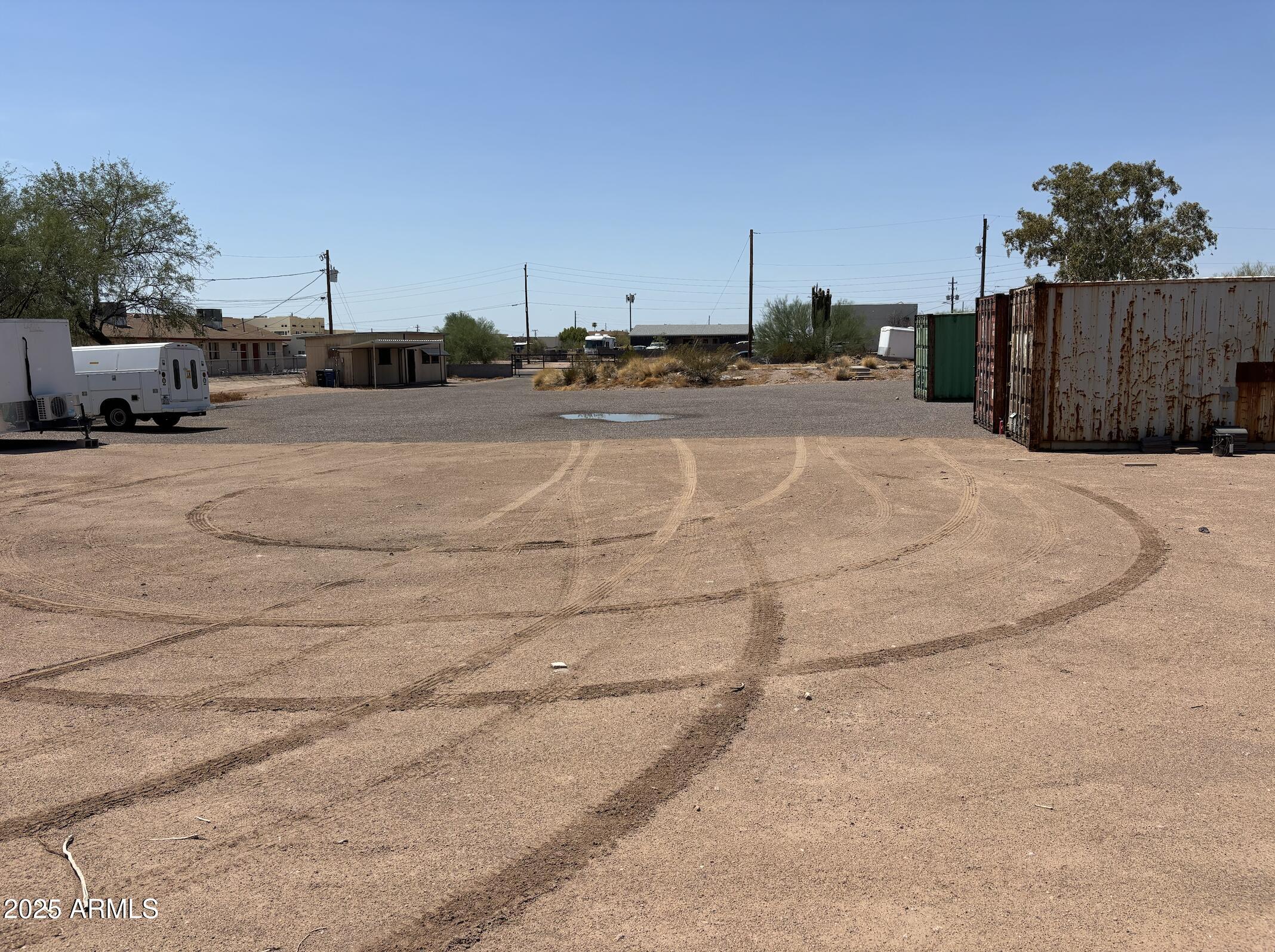 685 South Tomahawk Road Apache Junction, AZ 85119 - Photo 2 of 15 a view of a terrace with a bench