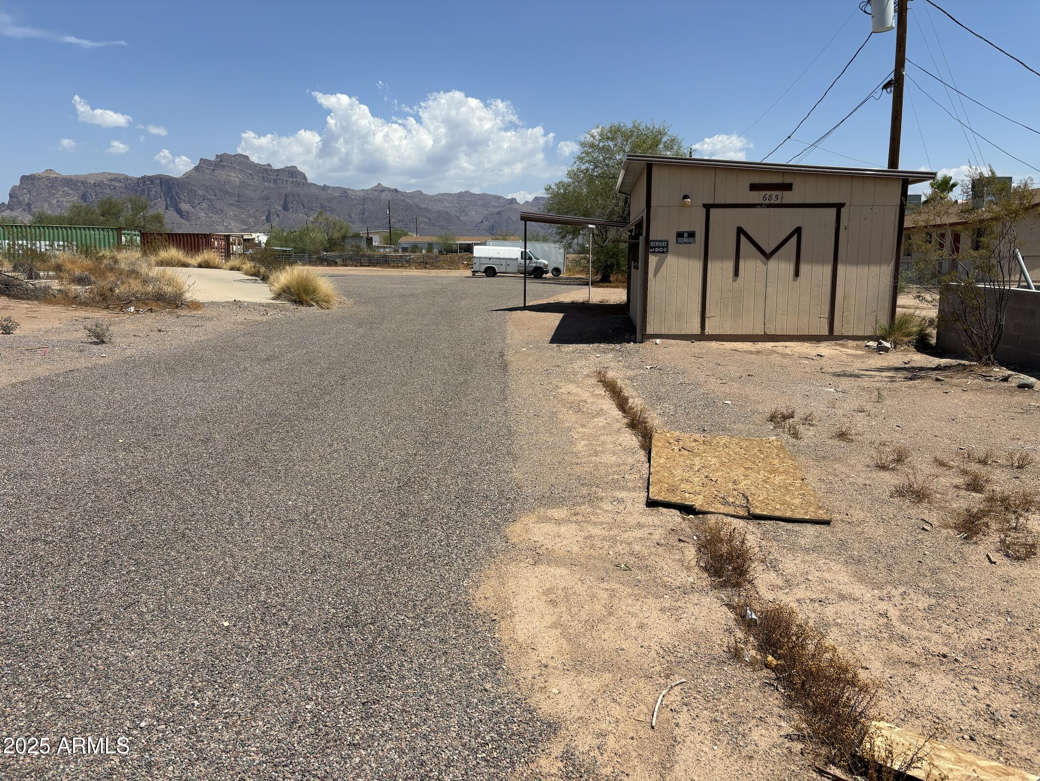 685 South Tomahawk Road Apache Junction, AZ 85119 - Photo 3 of 15 a view of a house with a yard