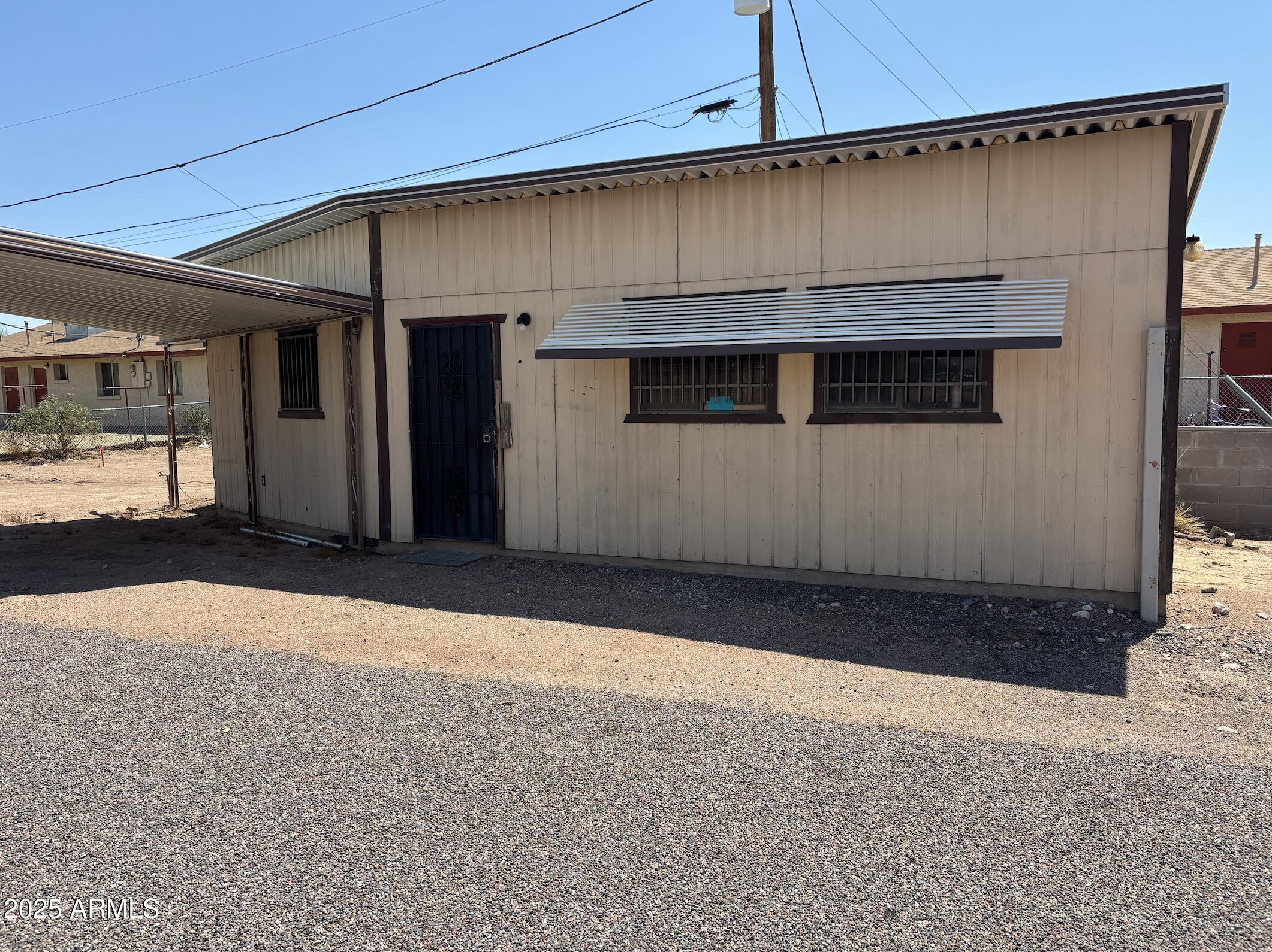 685 South Tomahawk Road Apache Junction, AZ 85119 - Photo 5 of 15 a front view of a house