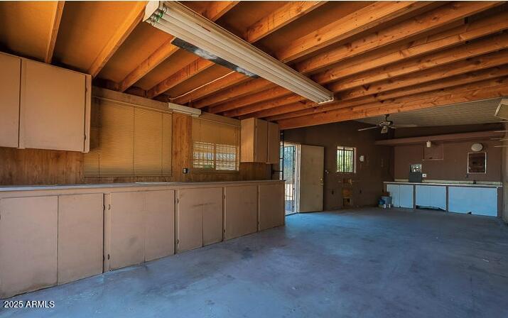 685 South Tomahawk Road Apache Junction, AZ 85119 - Photo 6 of 15 a kitchen with granite countertop sink and cabinets