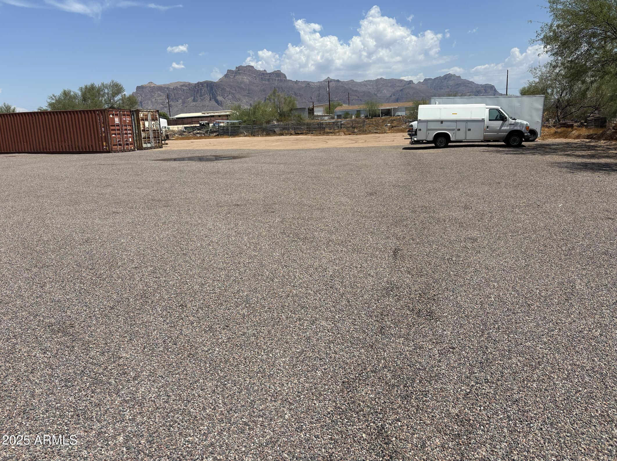 685 South Tomahawk Road Apache Junction, AZ 85119 - Photo 10 of 15 a view of street with parked cars
