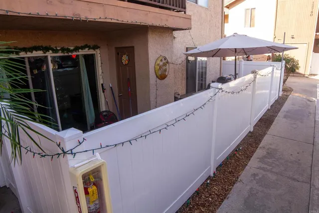 a view of a balcony with an outdoor space