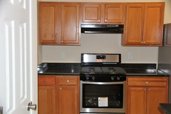 a bathroom with a sink a mirror and a shower