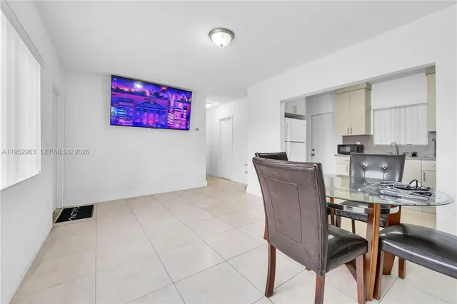 a view of kitchen with cabinets and wooden floor