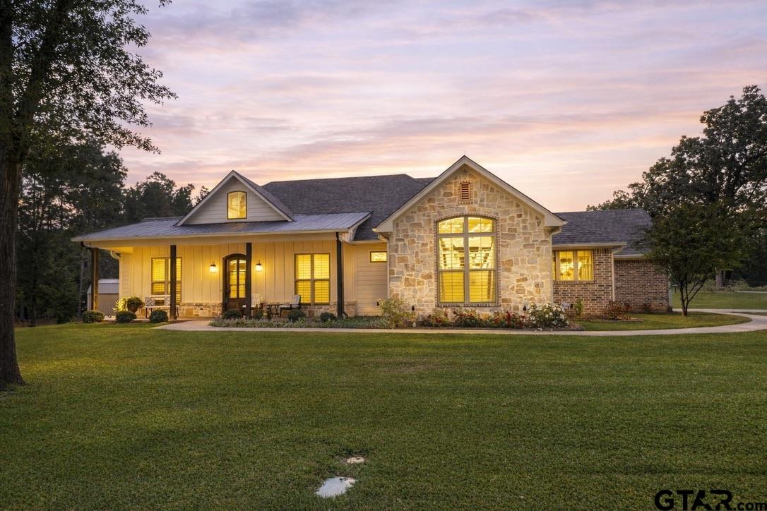 15733 County Road 1104 Flint, TX 75762 - Photo 2 of 32 a big house with a big yard and large trees