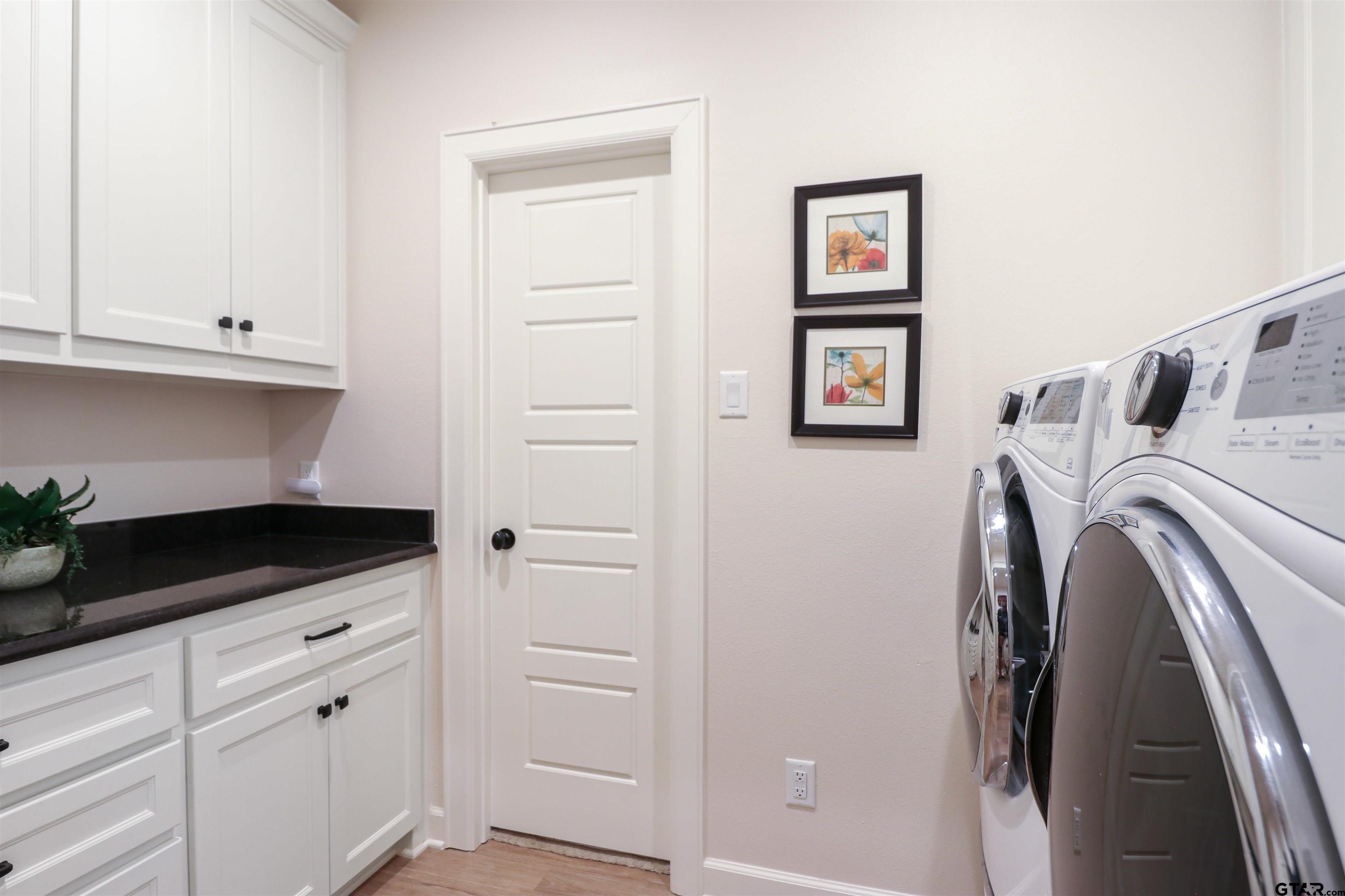 15733 County Road 1104 Flint, TX 75762 - Photo 23 of 32 a utility room with cabinets