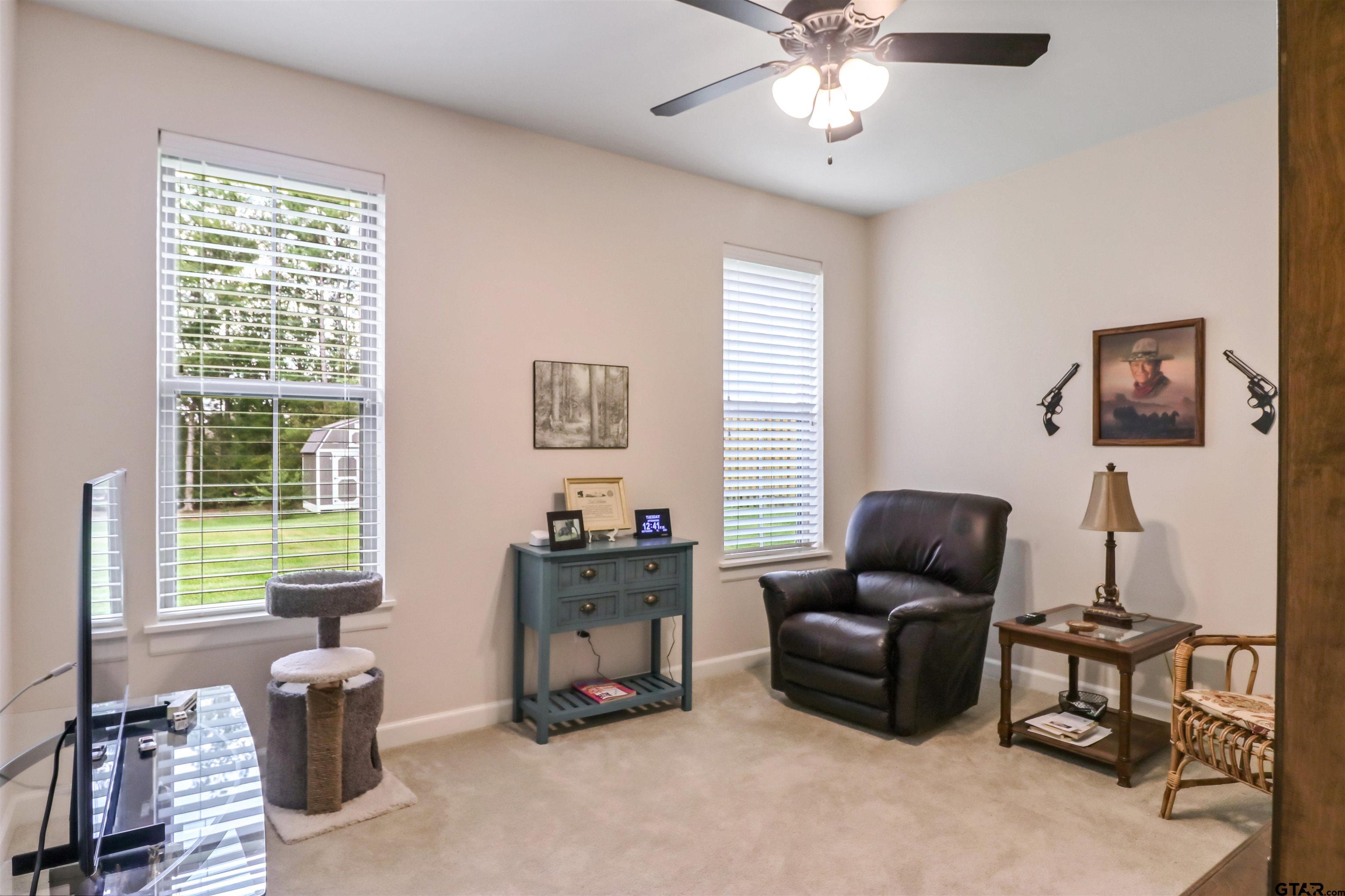 15733 County Road 1104 Flint, TX 75762 - Photo 25 of 32 a living room with furniture and a window
