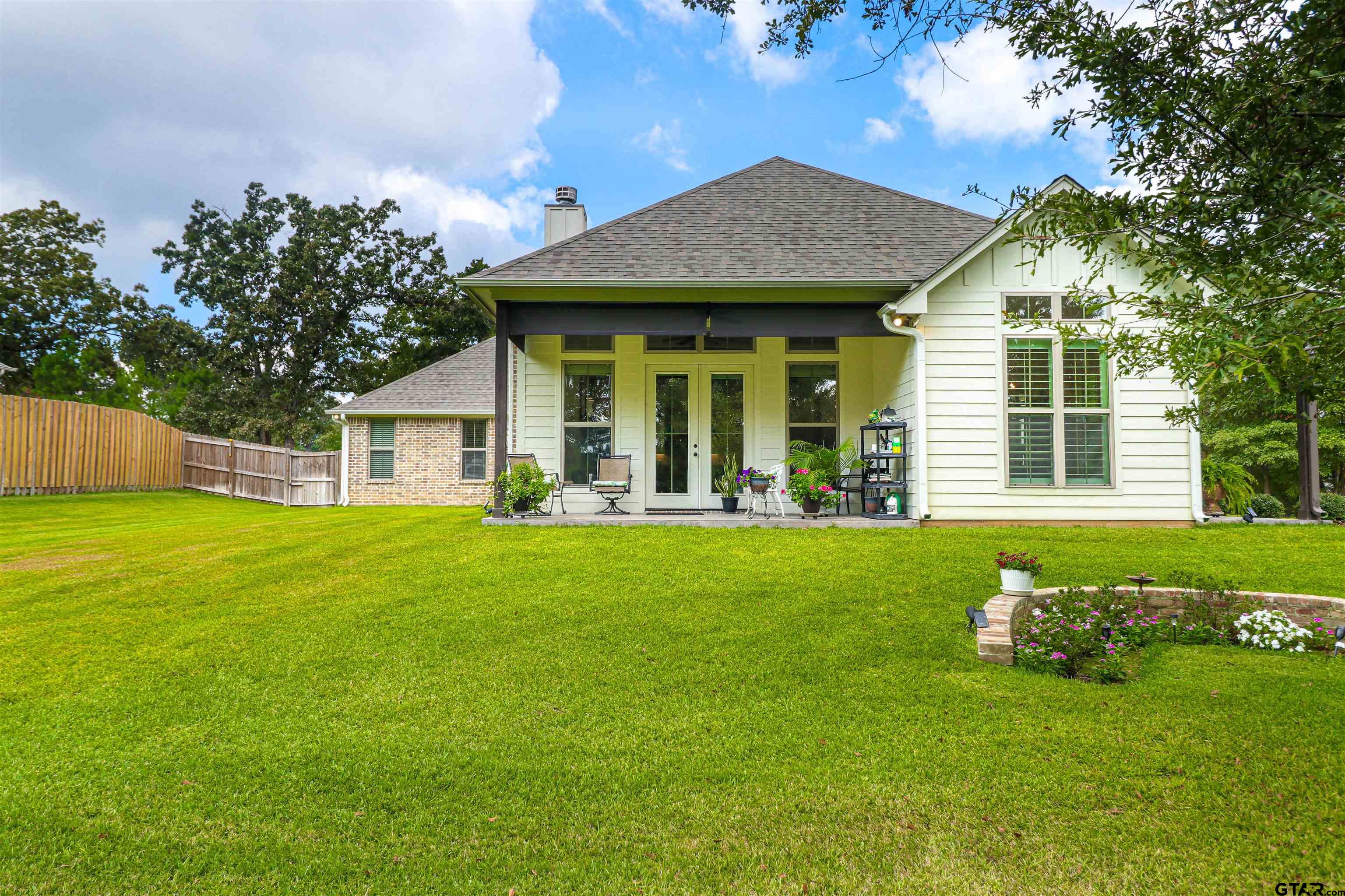 15733 County Road 1104 Flint, TX 75762 - Photo 30 of 32 a front view of a house with a garden