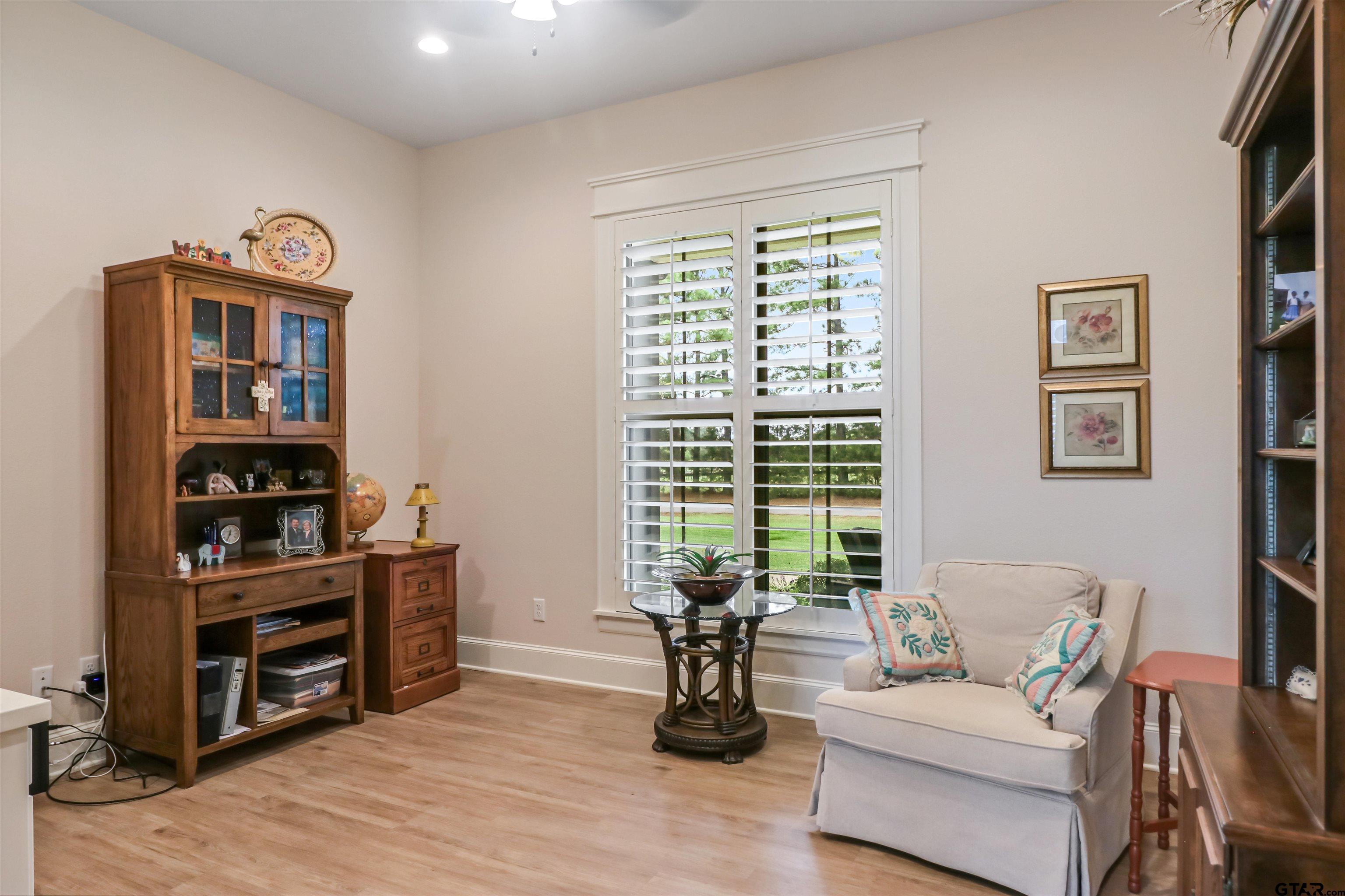 15733 County Road 1104 Flint, TX 75762 - Photo 7 of 32 a living room with furniture and a wooden floor