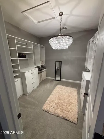 a bathroom with a sink toilet and a mirror