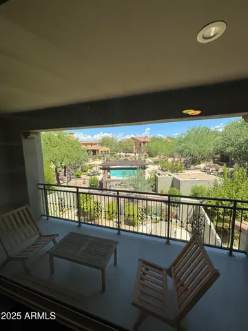 a view of a balcony with lake view