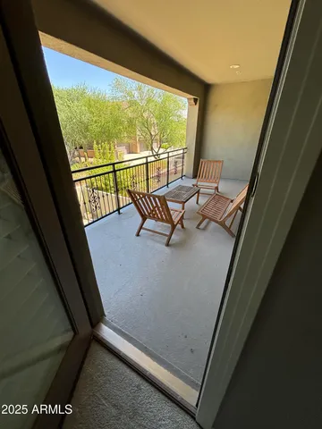 a view of a room with a large window