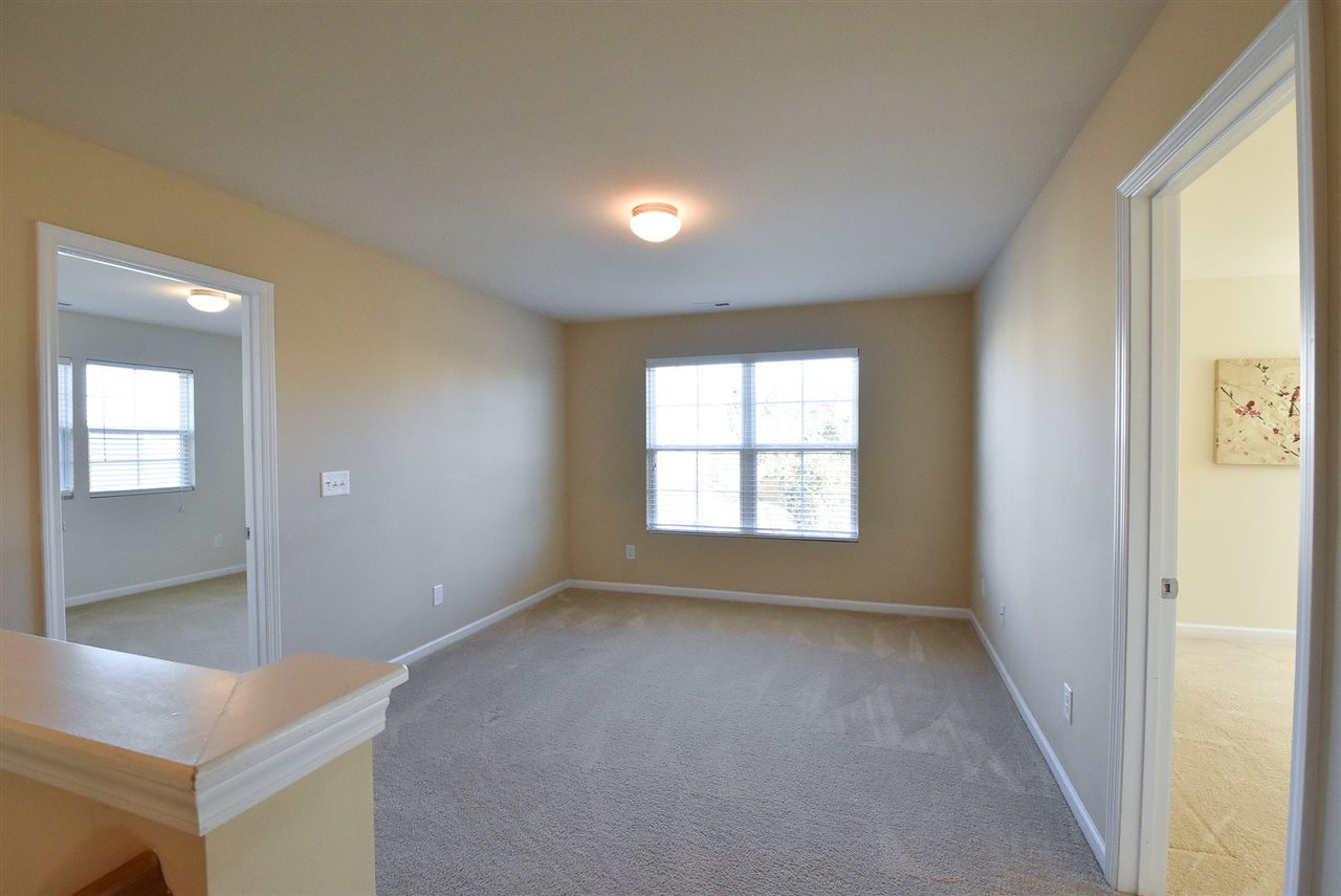 4201 Kellett Lane Raleigh, NC 27616 - Photo 14 of 30 2nd floor has neutral carpet throughout: the spacious Loft/Family Rm leads to the Bedrooms. Loft/Bonus Rm