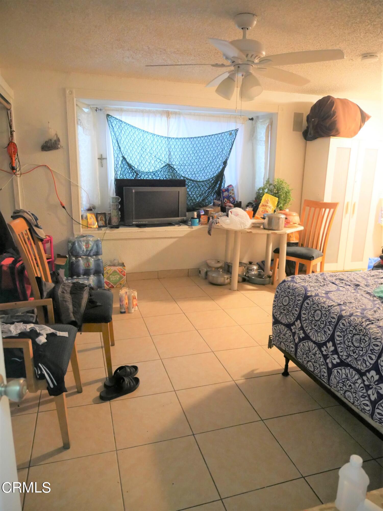 640 Tamarac Street Oxnard, CA 93033 - Photo 22 of 54 a living room with furniture and a fireplace