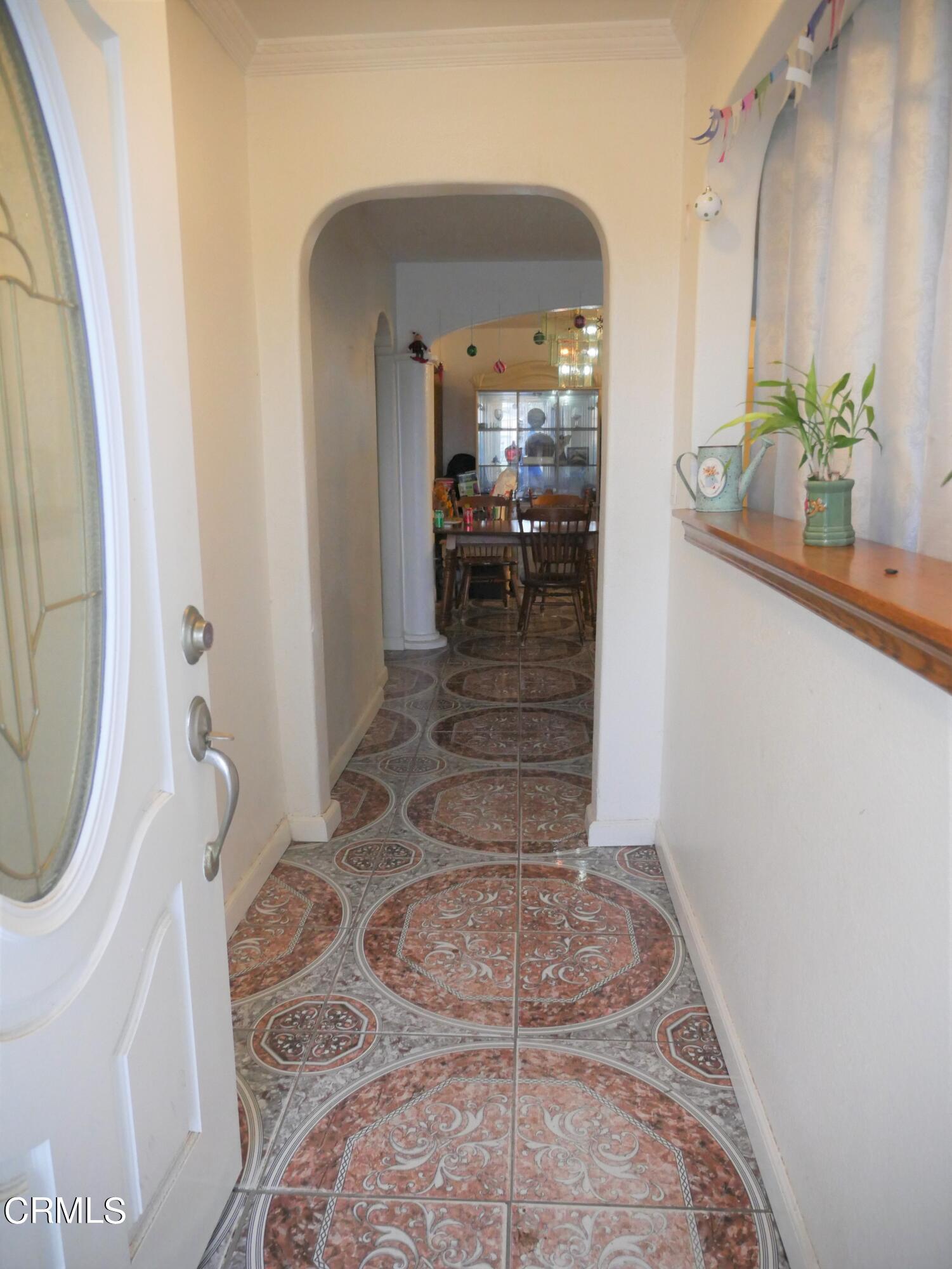 640 Tamarac Street Oxnard, CA 93033 - Photo 3 of 54 a room with wooden floor and furniture