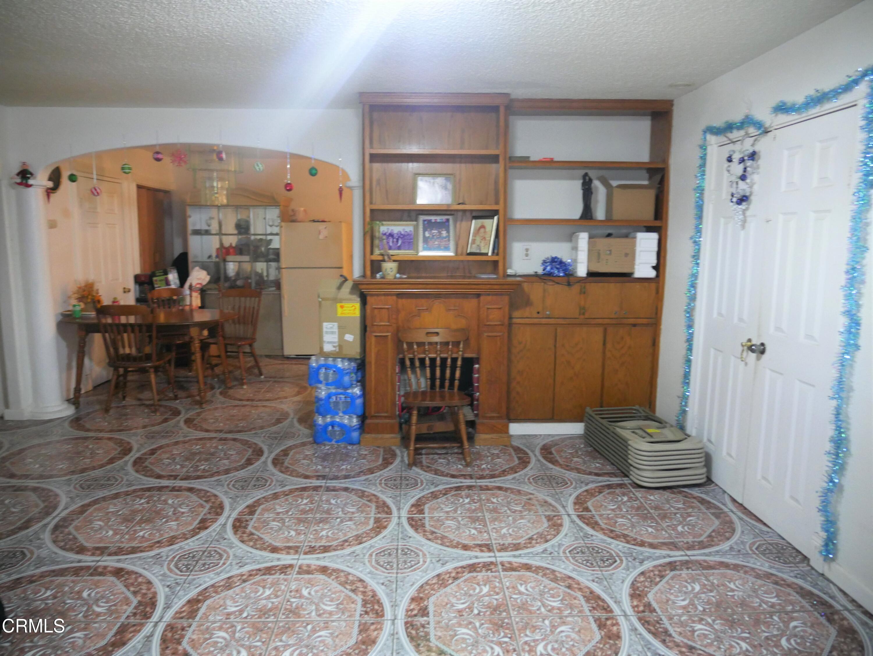 640 Tamarac Street Oxnard, CA 93033 - Photo 6 of 54 a room with furniture and a wooden floor