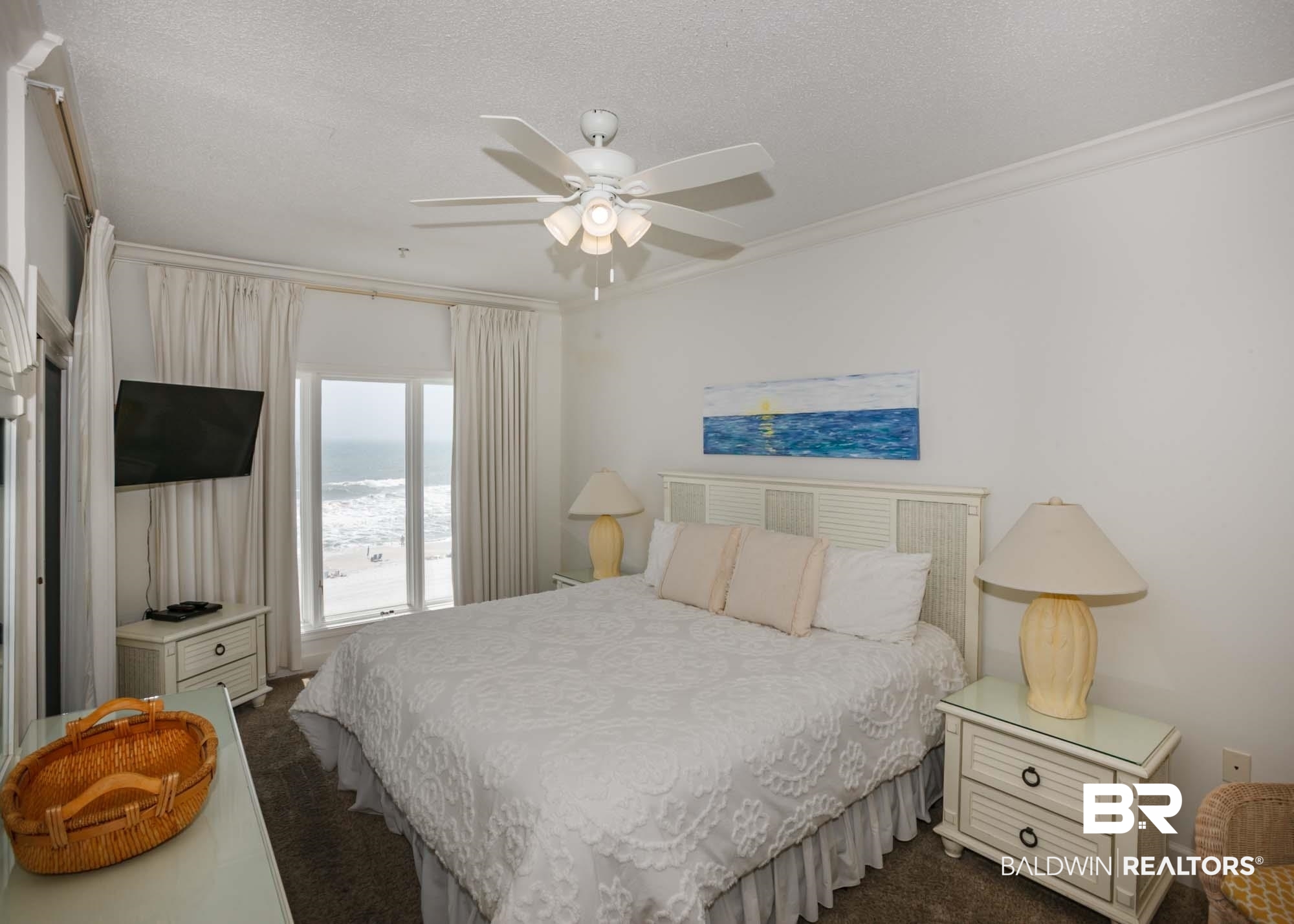28910 Perdido Beach Boulevard, Unit 4B Orange Beach, AL 36561 - Photo 22 of 48 Bedroom with a ceiling fan, dark colored carpet, ornamental molding, and a textured ceiling