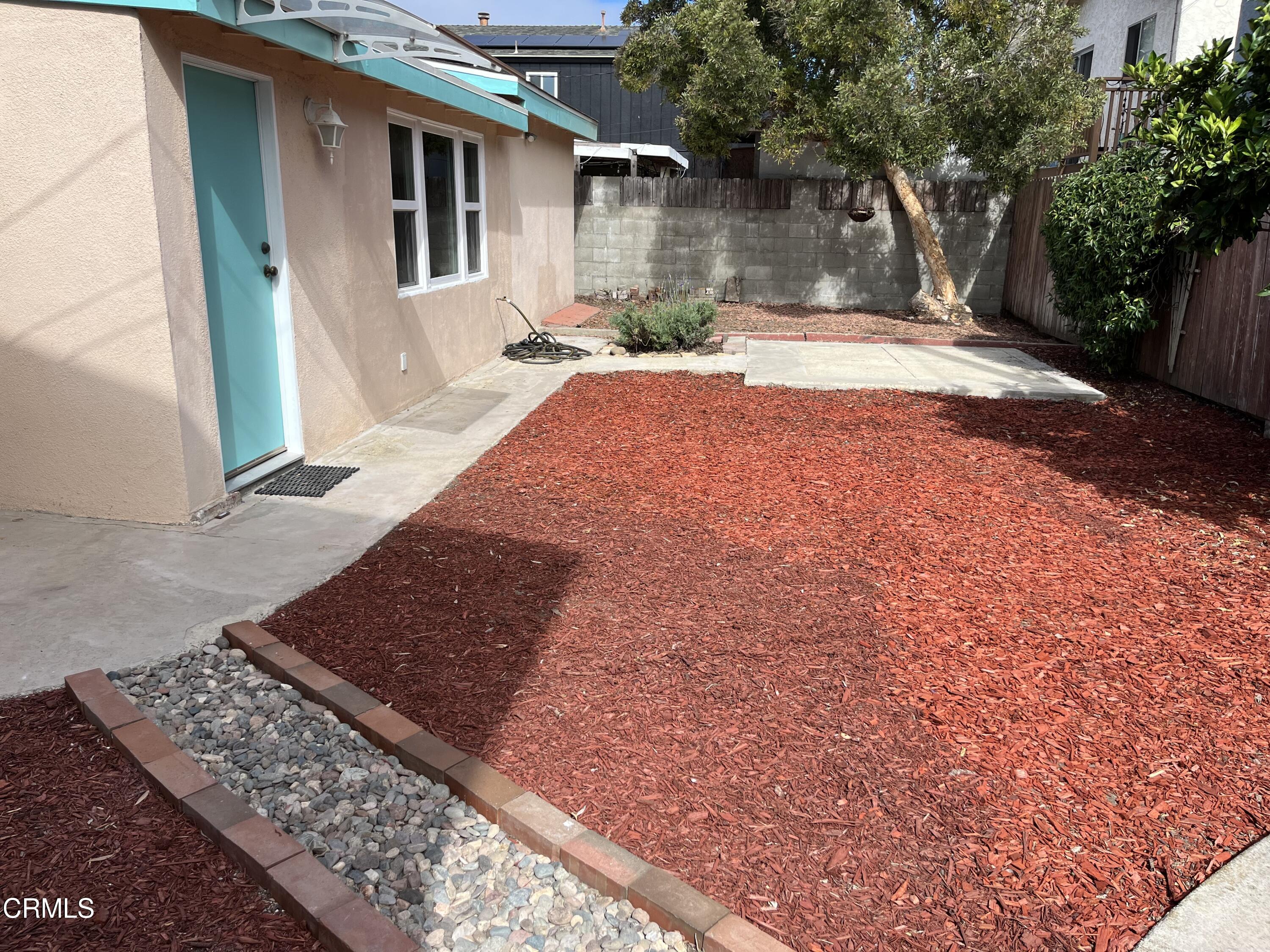 304 Cahuenga Drive Oxnard, CA 93035 - Photo 9 of 9 a front view of a house with a yard