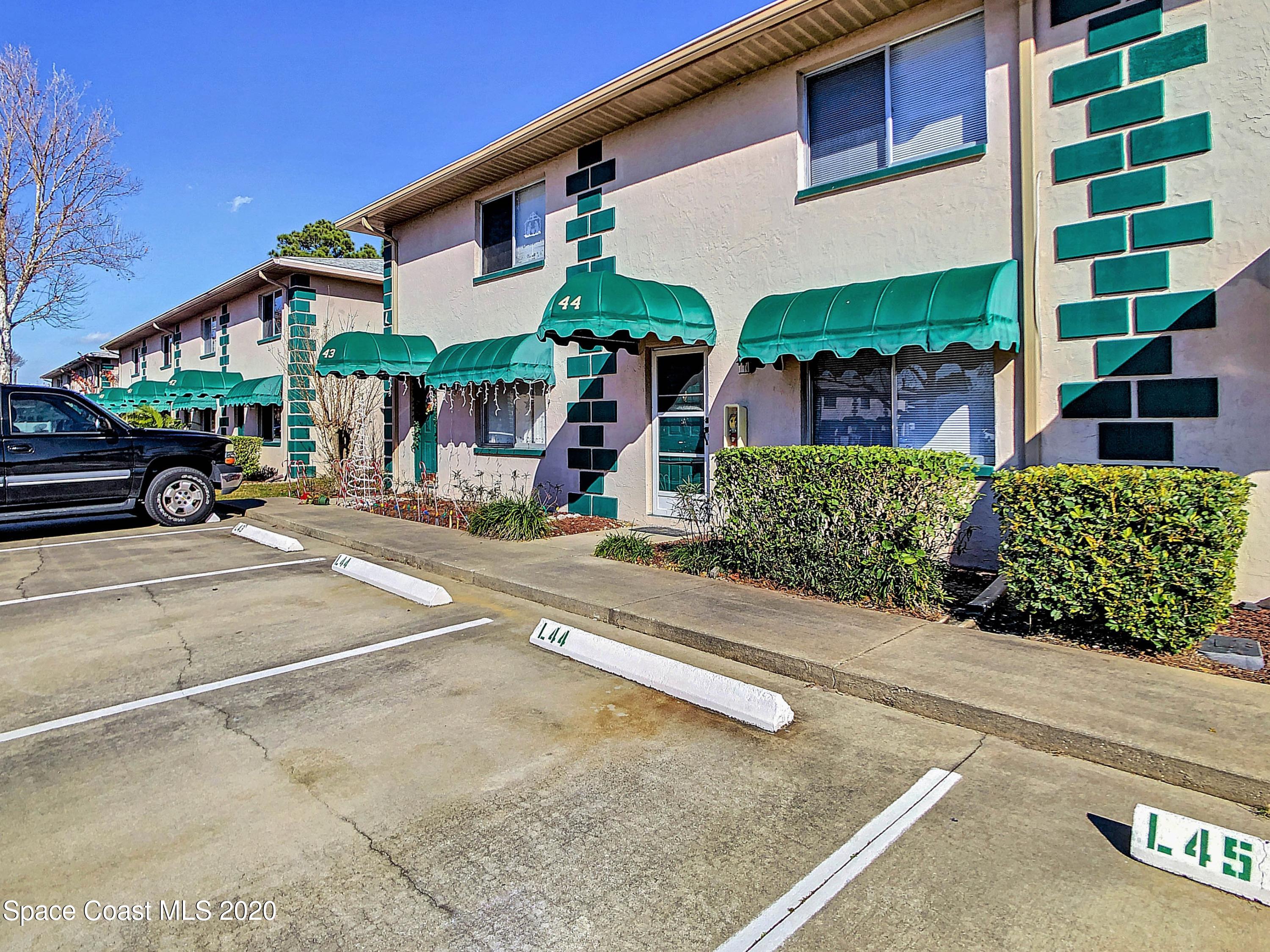 1882 Murrell Road, Unit 44 Rockledge, FL 32955 - Photo 2 of 27 a view of a building with a patio