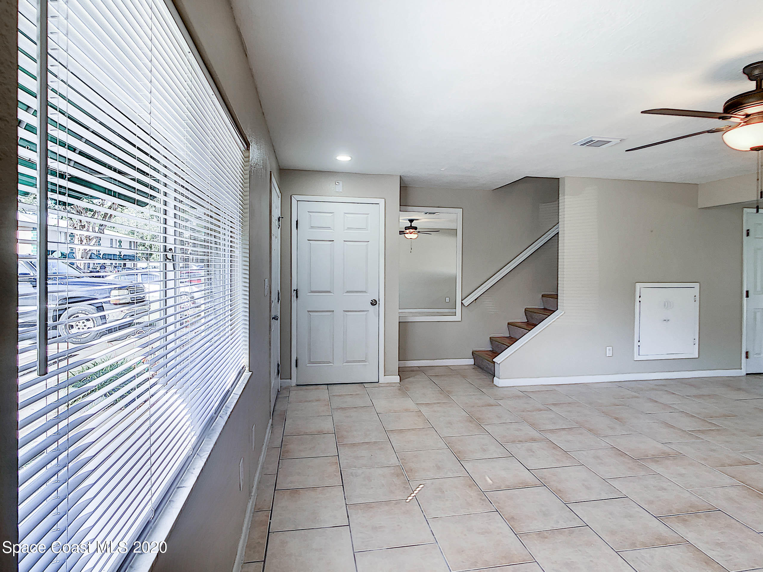 1882 Murrell Road, Unit 44 Rockledge, FL 32955 - Photo 3 of 27 a view of a hallway view with staircase