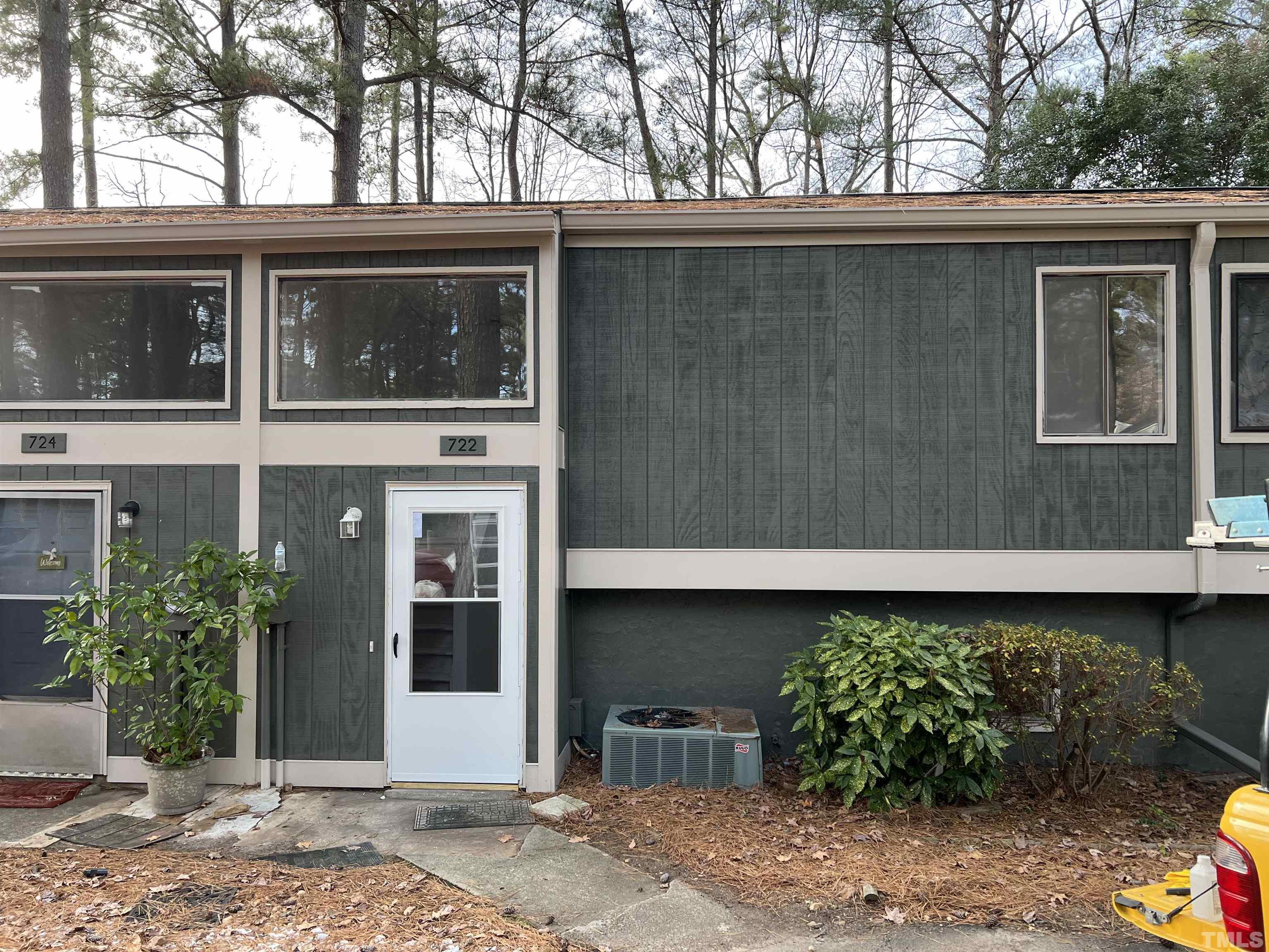 722 Godwin Court Raleigh, NC 27606 - Photo 2 of 41 a front view of a house with garden